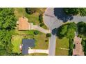 An aerial view showcasing a home with a spacious lot and proximity to the neighborhood cul-de-sac at 4090 Welcome All Ter, Atlanta, GA 30349