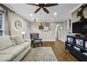 Cozy living room with neutral tones, hardwood floors, and ample natural light at 2436 Elmwood Se Cir, Atlanta, GA 30339
