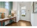 Charming entryway featuring hardwood floors, stylish lamps, and decorative accents at 569 Stone Field Nw Run, Marietta, GA 30060