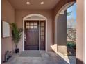 Inviting front entryway with a decorative wooden door and tiled flooring at 1865 Berkeley Mews Ne, Atlanta, GA 30329