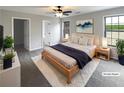 Bedroom featuring neutral colors, soft carpet, and a cozy atmosphere at 3151 Victoria Place Dr, Loganville, GA 30052