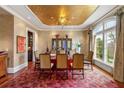 Sophisticated dining room featuring a large window, stylish decor, and ample seating at 4266 Woodland Brook Se Dr, Atlanta, GA 30339