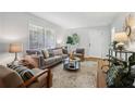Bright living room featuring a neutral color palette, hardwood floors, and contemporary decor at 1943 Main Nw St, Atlanta, GA 30318