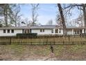 Spacious backyard enclosed by a wooden fence, offering privacy and room for outdoor activities at 2508 Brookwood Ne Dr, Atlanta, GA 30305