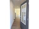 Inviting entryway showcasing hardwood floors and a bright, open floor plan leading to the living area at 2359 Brown Dove Way (Lot 2), Grayson, GA 30017