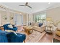 Bright living room featuring hardwood floors, stylish furniture, and ample natural light at 3232 Cates Ne Ave, Brookhaven, GA 30319