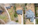 Aerial view of the property showcasing the house layout, surrounding trees, and neighborhood at 1788 Piper Se Cir, Atlanta, GA 30316