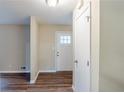 Foyer with a white front door and dark-toned wood flooring at 2202 Troutdale Dr, Decatur, GA 30032