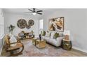 Cozy living room with stylish furniture, decorative wall art, natural light, and a comfortable seating arrangement at 3393 Phillip Cir, Decatur, GA 30032