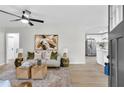 Bright living room featuring modern decor, comfortable seating, stylish coffee tables, and hardwood floors at 3393 Phillip Cir, Decatur, GA 30032