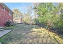 Spacious backyard with a chain-link fence and plenty of space for outdoor activities at 3073 Henderson Mill Rd, Atlanta, GA 30341