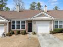 Inviting single-story home with a one-car garage, attractive brick accents, and a neatly maintained lawn at 420 Copeland St, Grayson, GA 30017
