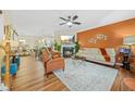 Cozy living room with fireplace, modern furnishings, and hardwood floors at 1976 Drennon Ave, Austell, GA 30106