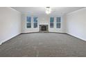 Bright living room with fireplace and lots of natural light at 405 Sora Dr, Stockbridge, GA 30281