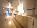 Bright kitchen with natural light, lots of counter space, and vintage cabinetry at 74 Cooper Dr, Dallas, GA 30157