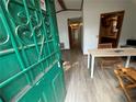 Entryway with a table and chairs, and a view to the kitchen at 3118 Rockbridge Road Southwest, Avondale Estates, GA 30002