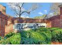 Stone sign for Westover Plantation surrounded by lush landscaping at 11 Newport Nw Pl, Atlanta, GA 30318