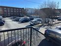 View of parking lot from stairs, convenient parking for residents, secure at 172 Haynes Sw St # 102, Atlanta, GA 30313