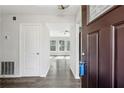 Inviting entryway showcasing open floor plan with new flooring and lots of light at 5368 Stafford Nw Dr, Lilburn, GA 30047