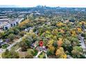 Aerial view of the home nestled among lush trees in Atlanta, Georgia at 2612 Arlene Ne Way, Atlanta, GA 30305