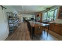 Open-concept kitchen with a long island and stainless steel appliances at 4267 Klondike Rd, Lithonia, GA 30038
