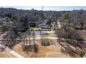 Scenic view of the home in a quiet neighborhood, surrounded by lush trees at 382 Golfview Nw Rd, Atlanta, GA 30309