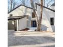 Charming home with a neutral color scheme and mature trees in a beautiful setting at 4830 Rebel Nw Trl, Sandy Springs, GA 30327