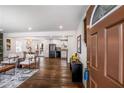 Inviting living space with hardwood floors, leading to a modern kitchen and dining area at 2003 Cogar Dr, Decatur, GA 30032