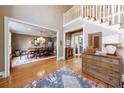 Open foyer showcasing hardwood floors and staircase with views to dining room and other rooms at , Atlanta, GA 30327