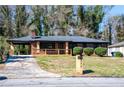 Beautiful single-story brick home with a covered carport and a well-maintained yard at 228 W Simon Nw Ter, Atlanta, GA 30318
