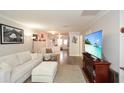 Cozy living room with hardwood floors, neutral paint, and lots of comfortable seating at 125 N River Dr # F, Atlanta, GA 30350