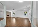 Bright and airy living room with wood floors, fresh neutral paint, and brick fireplace at 4770 Wayland Cir, Acworth, GA 30101