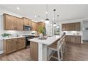 Spacious kitchen features an oversized island, sleek countertops, and custom cabinetry at 1639 Tide Mill Rd, Cumming, GA 30040