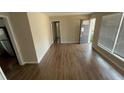 Bright living room featuring hardwood floors, neutral paint, and natural light at 4027 Gladesworth Ln, Decatur, GA 30035