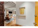 Inviting entryway featuring hardwood floors and an open floor plan with exposed brick accents at 500 Means Nw St # F, Atlanta, GA 30318