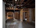 Unfinished basement featuring exposed wooden beams and flooring at 837 Metropolitan Pkwy, Atlanta, GA 30310