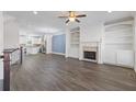 Bright living room featuring hardwood floors, a ceiling fan, and an open layout at 2710 Birch Grove Se Ln # 13, Marietta, GA 30067