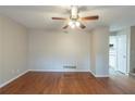 Open living area with hardwood floors and a ceiling fan at 3090 Chimney W Rdg, Snellville, GA 30078