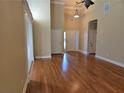 Spacious foyer with hardwood floors, high ceilings, and entry to other rooms at 2110 Retreat Haven Ln, Dacula, GA 30019