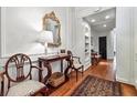 Beautiful foyer with hardwood floors, decorative mirror, and stylish furniture creating a welcoming ambiance at 3131 Nw Slaton Nw Dr # 24, Atlanta, GA 30305