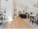 Open-concept living space featuring hardwood floors, modern finishes, and an eat-in kitchen at 260 Miller Reed Se Ave, Atlanta, GA 30315