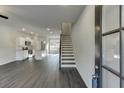 Bright, open living space with hardwood floors and easy access to the modern kitchen at 475 Collins Industrial Way, Lawrenceville, GA 30046