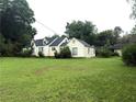 Quaint single-story home with a neatly kept lawn and classic design elements at 2535 Glenwood Se Ave, Atlanta, GA 30317