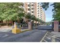 Gated entrance to the active senior community; notice the pedestrian gate and well-maintained landscaping at 300 Johnson Ferry Ne Rd # B411, Atlanta, GA 30328