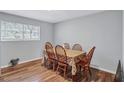 Dining room area with wood chairs and a table at 4701 Flat Shoals Rd # 37C, Union City, GA 30291