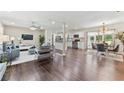 Spacious living room that opens to a modern kitchen and elegant dining area, perfect for entertaining at 3263 Dodson Dr, Atlanta, GA 30344