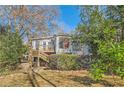 Spacious backyard features a deck and stairs down to a secluded landscaped yard at 959 Glen Arden Ne Way, Atlanta, GA 30306