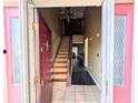 Inviting entryway with a staircase and views into the living area, creating an open and airy feel at 1554 Circlestone Dr, Stone Mountain, GA 30088