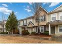 Charming townhome showcasing neutral siding, manicured landscaping, and an inviting covered entrance at 3541 Parc Sw Cir, Atlanta, GA 30311
