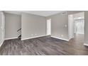 Bright living room with stylish hardwood floors and neutral walls, showcasing a welcoming space at 3236 Abbeywood Dr, Decatur, GA 30034